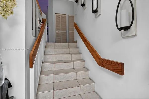 a view of stairs and an entryway