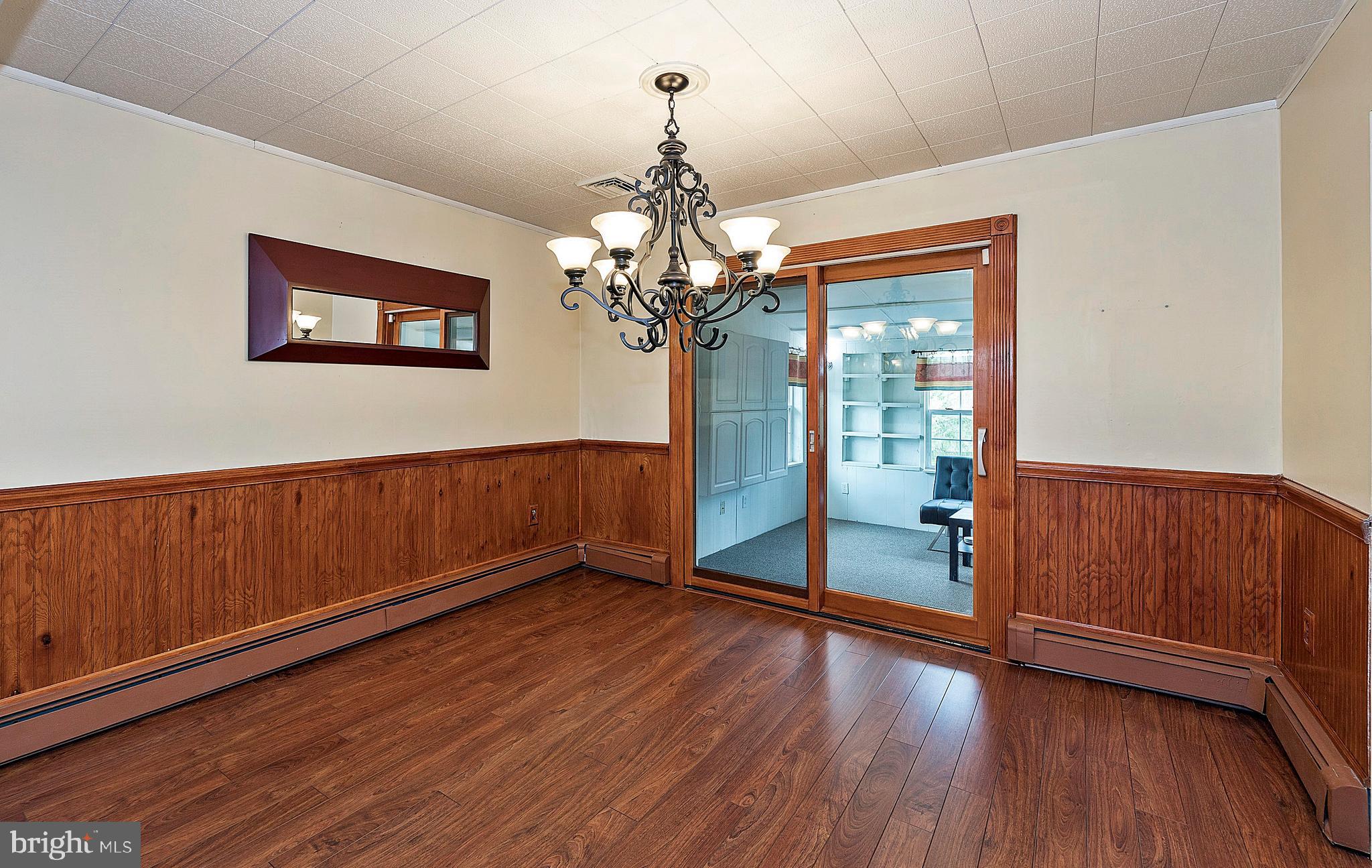 1107 West Bridge Street Spring City, PA 19475 - Photo 12 of 34 Dining Room with Slider to Sunroom