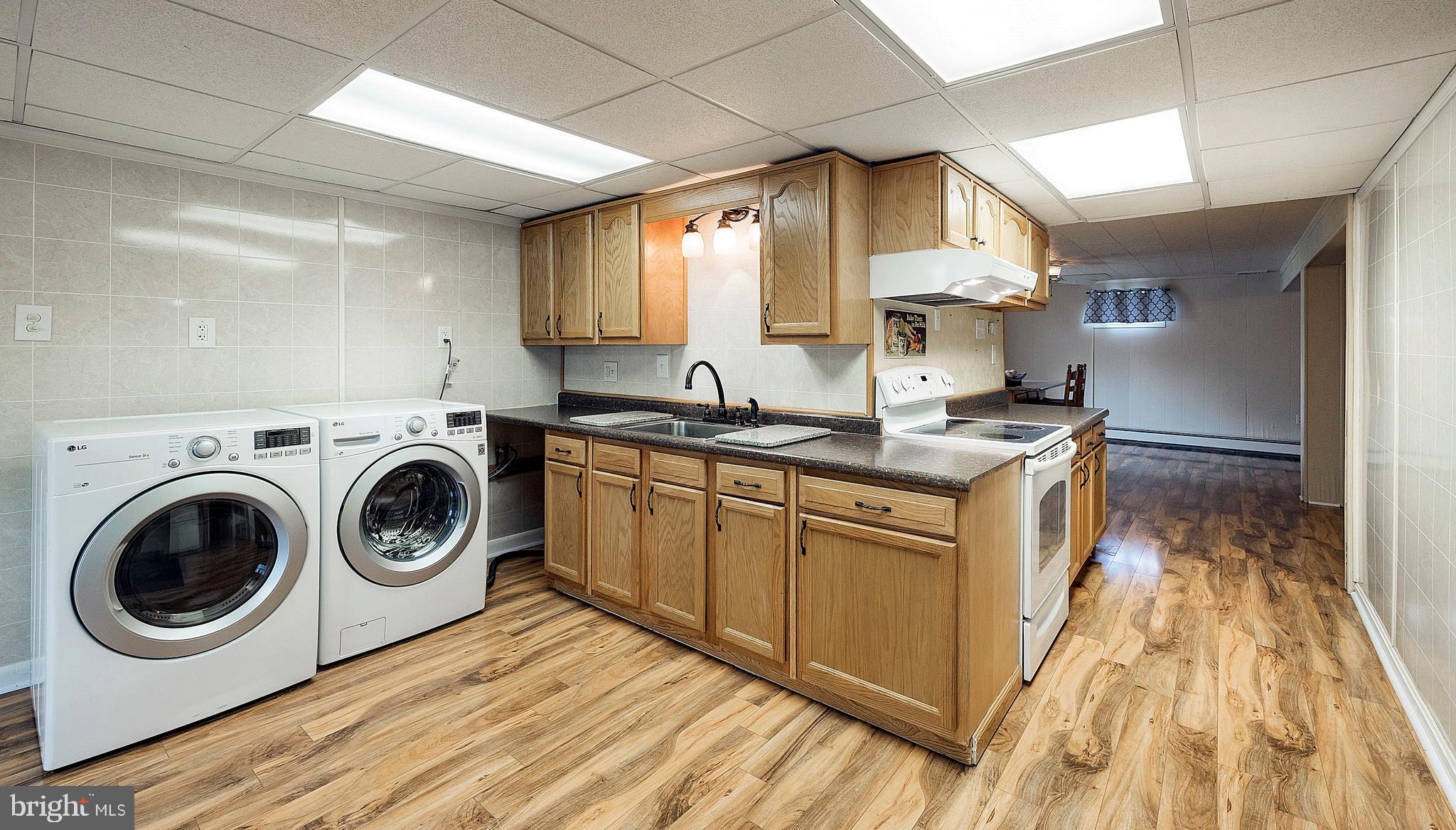 1107 West Bridge Street Spring City, PA 19475 - Photo 31 of 34 In-Law Suite or LL Kitchenette and Laundry Area