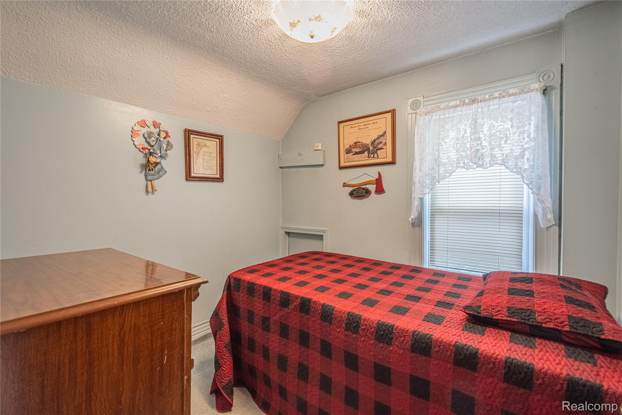 8384 Imlay City Road Avoca, MI 48006 - Photo 36 of 39 Room with a single window featuring blinds and a decorative valance