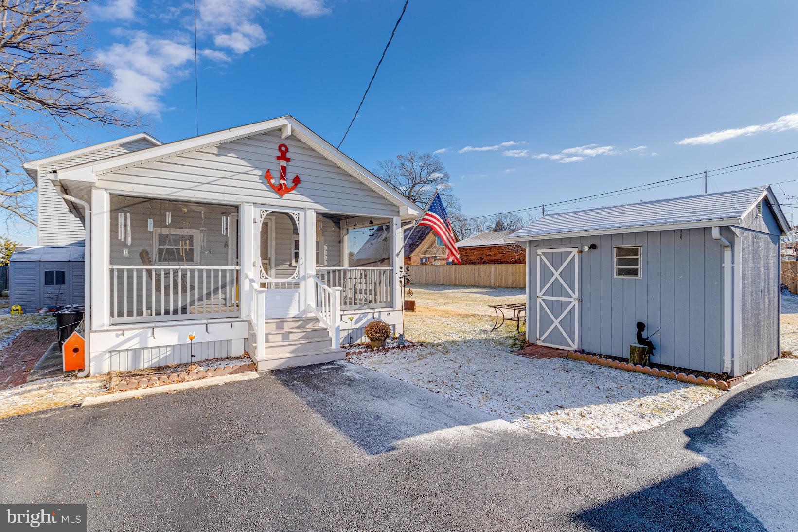 215 Nanticoke Road Essex, MD 21221 - Photo 1 of 28 Charming coastal cottage with inviting porch.