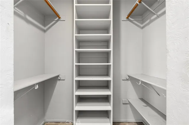 a view of a pathway in a yard along with trees