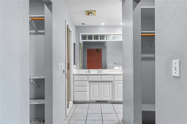 a view of a house with a street