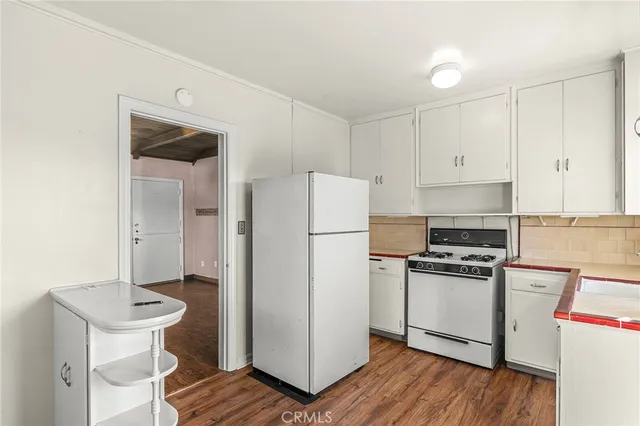 an aerial view of residential building and parking space