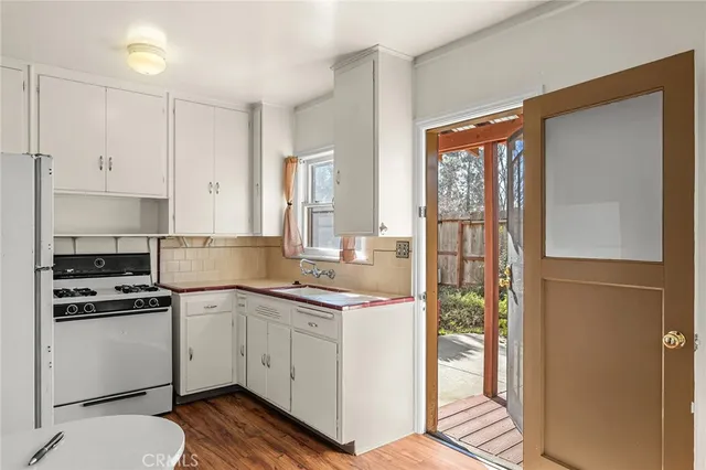 an aerial view of residential building and parking space