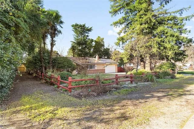 a view of livingroom with furniture fire place and windows