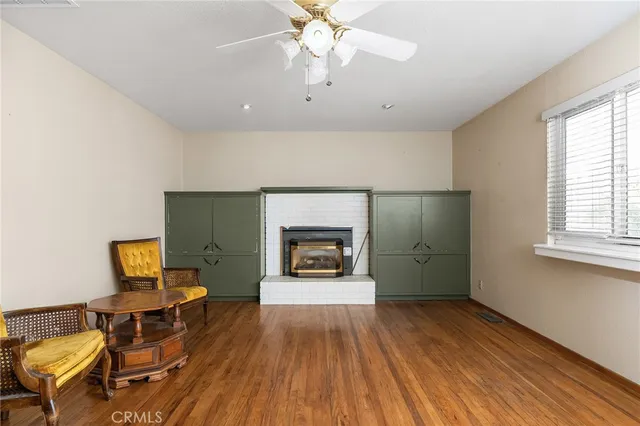 a kitchen with stainless steel appliances kitchen island granite countertop a sink and cabinets