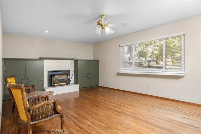 a kitchen with stainless steel appliances granite countertop a stove a refrigerator and a sink