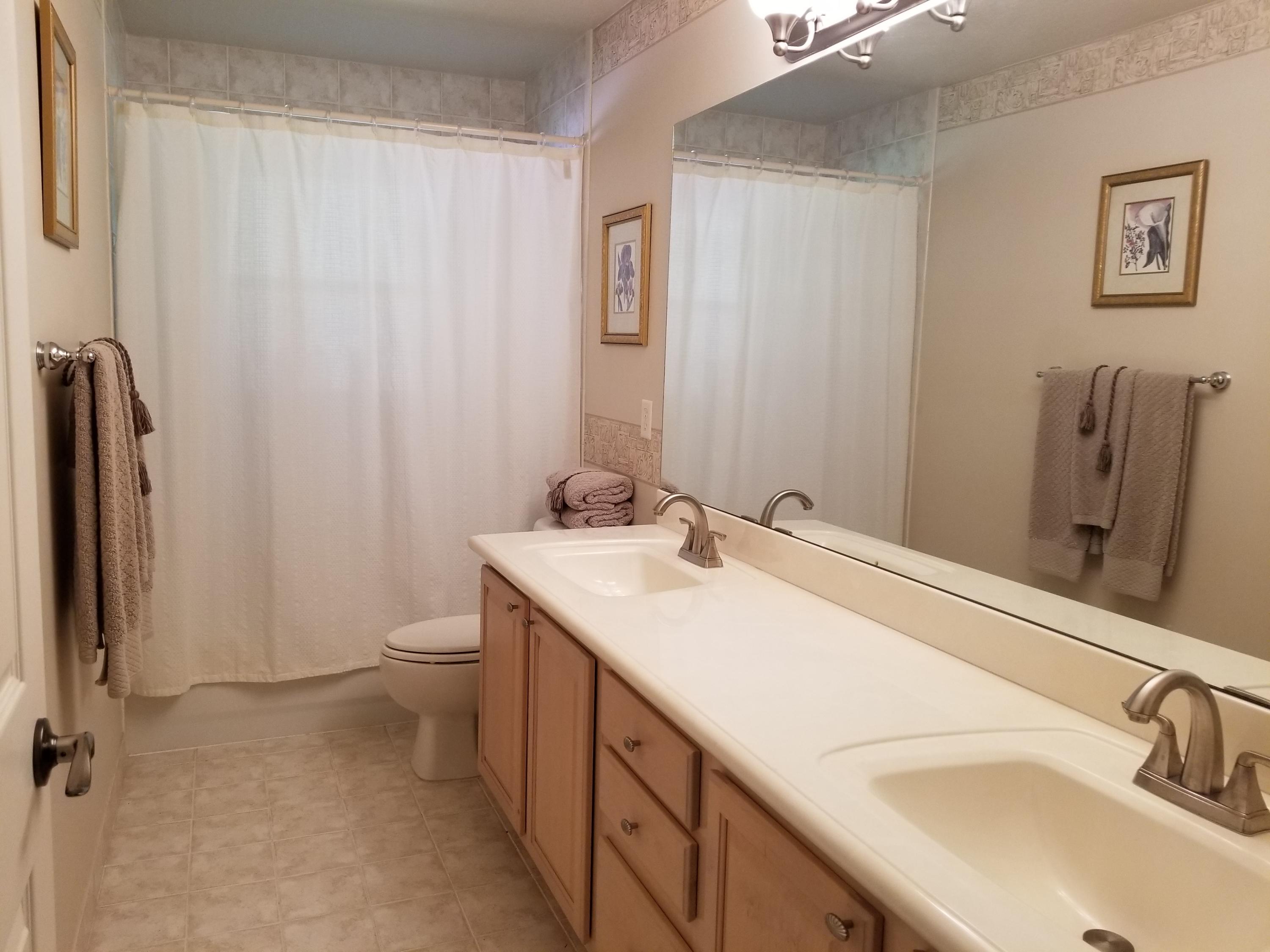 6037 Reynolds Road Lake Worth, FL 33449 - Photo 32 of 44 hall bath
