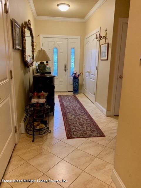 26 Tides Lane Staten Island, NY 10309 - Photo 13 of 41 a living room with furniture