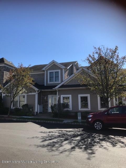 26 Tides Lane Staten Island, NY 10309 - Photo 3 of 41 a front view of a house with a yard