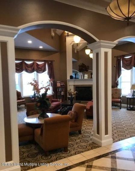 26 Tides Lane Staten Island, NY 10309 - Photo 38 of 41 a living room with furniture and a large window