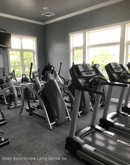 26 Tides Lane Staten Island, NY 10309 - Photo 40 of 41 a view of a room with gym equipment