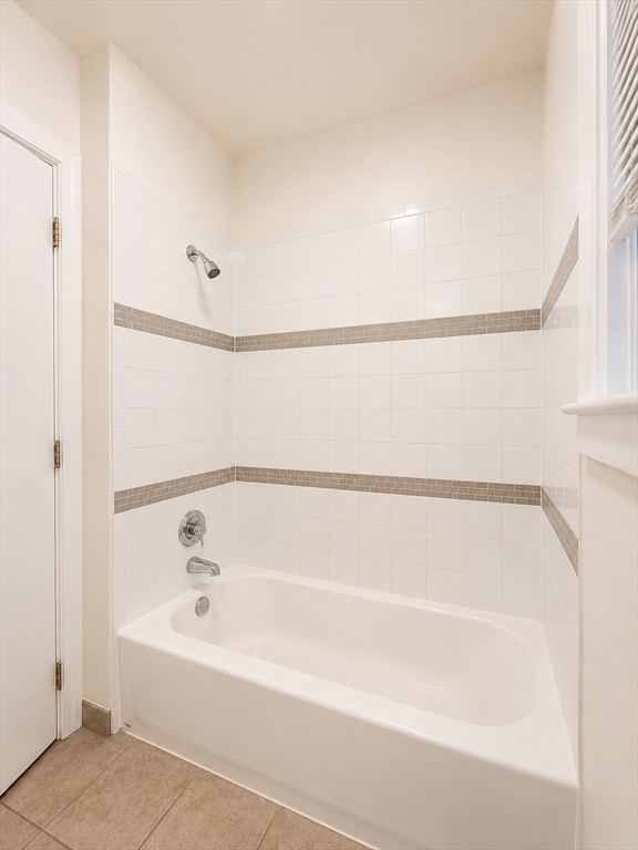 128 Shawmut Street, Unit 2 Chelsea, MA 02150 - Photo 12 of 12 a bathroom with a bathtub