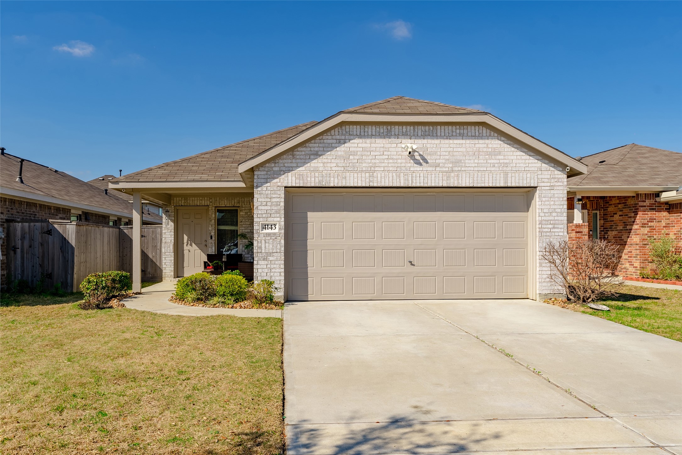 a front view of a house with a garage