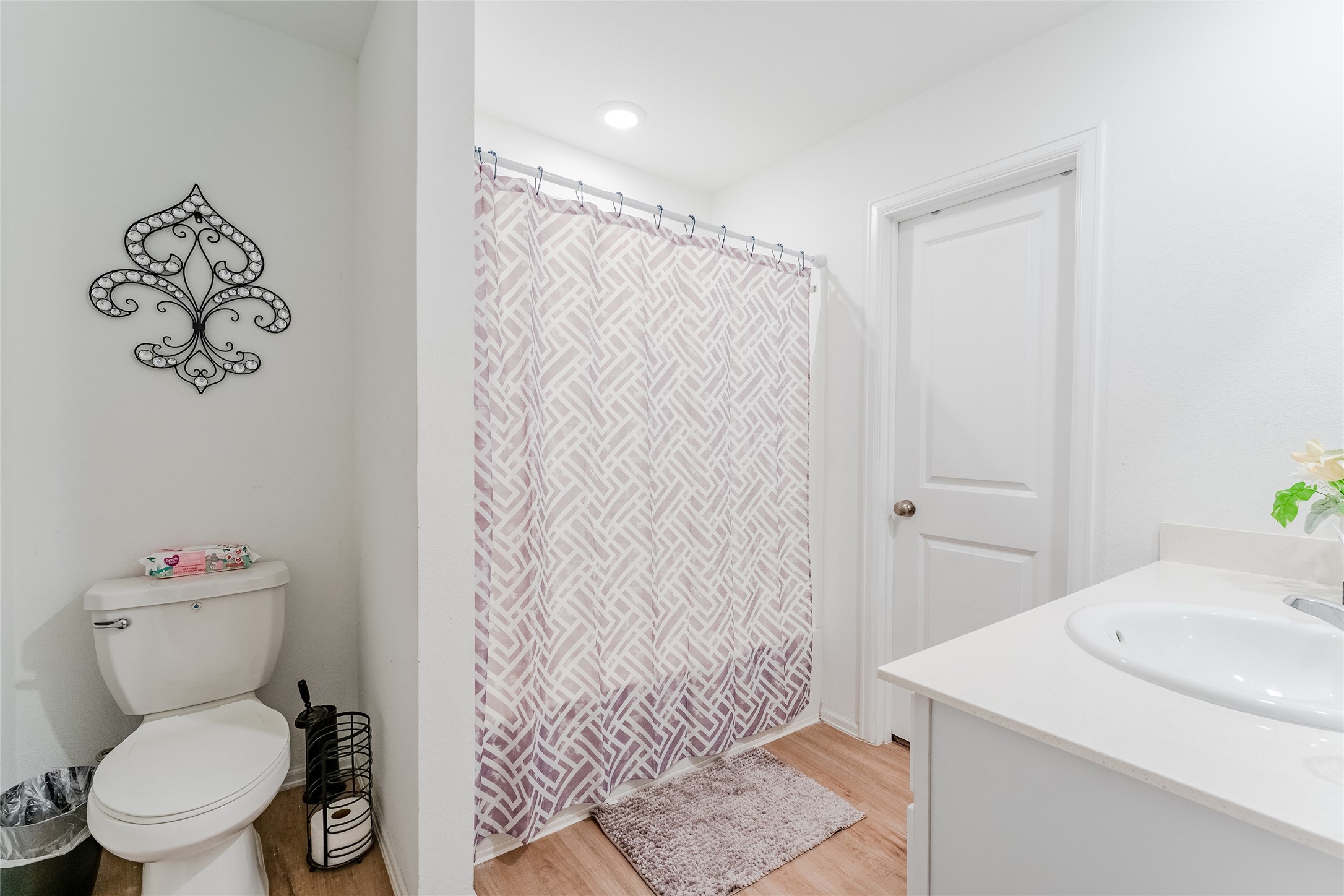 4143 Saltillo Lakes Drive Baytown, TX 77521 - Photo 15 of 29 a bathroom with a sink and a toilet