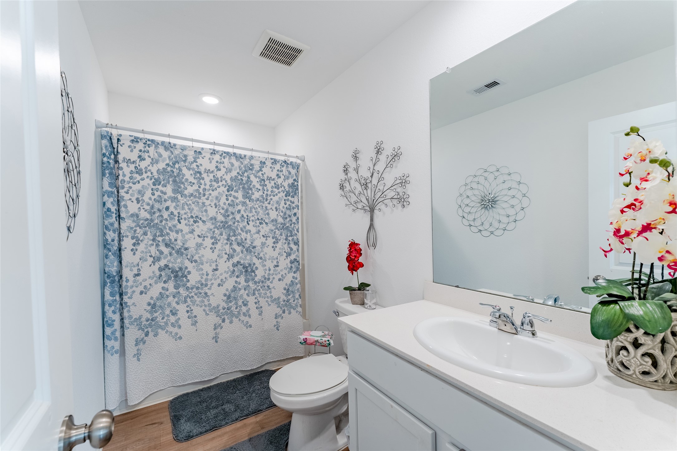 4143 Saltillo Lakes Drive Baytown, TX 77521 - Photo 18 of 29 a bathroom with a sink toilet and shower