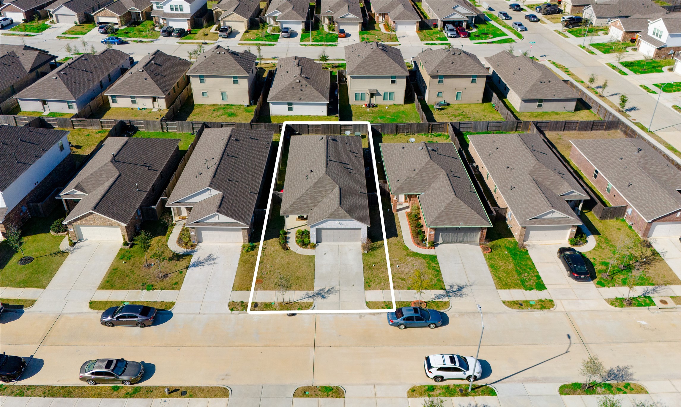 4143 Saltillo Lakes Drive Baytown, TX 77521 - Photo 23 of 29 an aerial view of residential houses with outdoor space