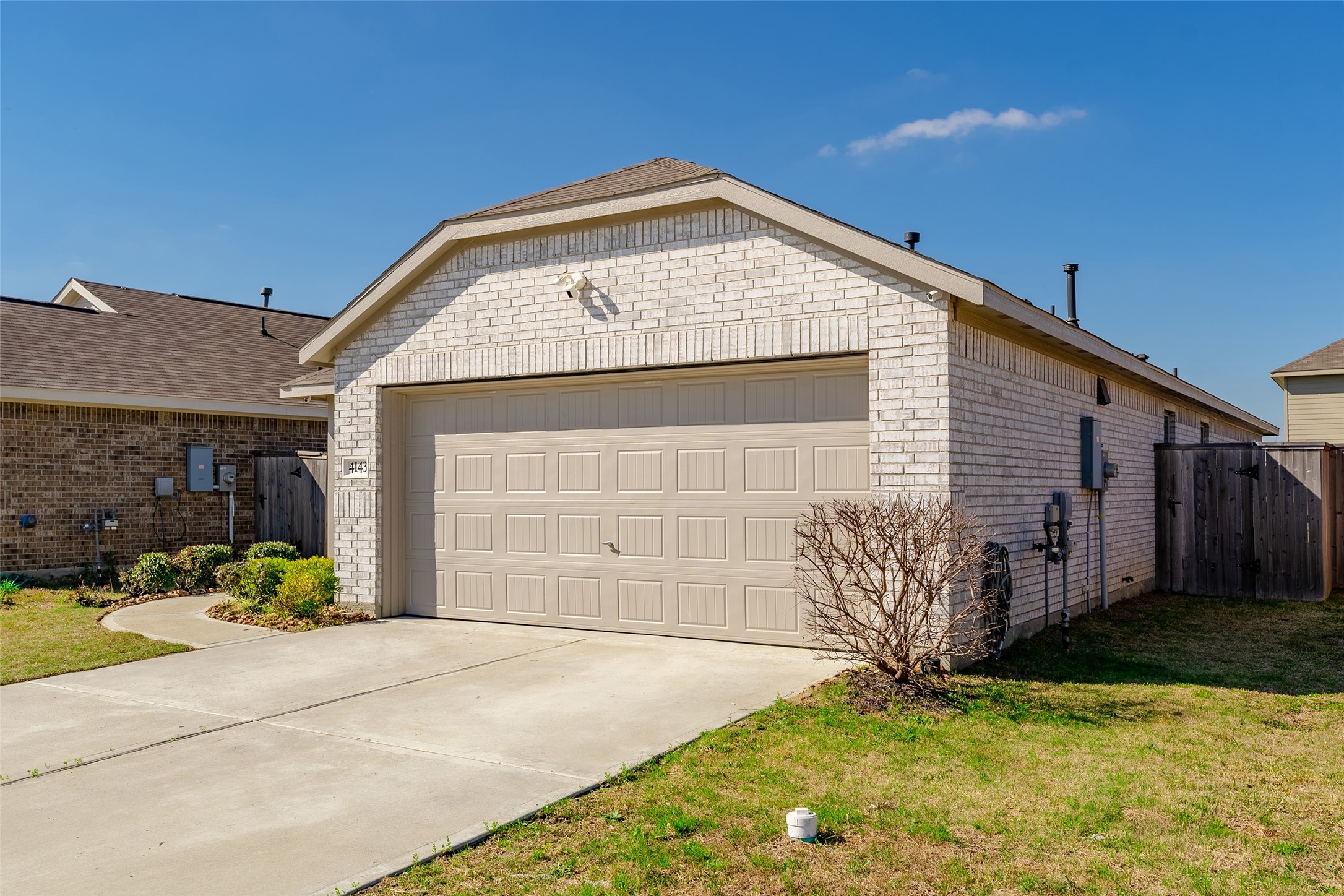 4143 Saltillo Lakes Drive Baytown, TX 77521 - Photo 3 of 29 a front view of a house with a yard and garage