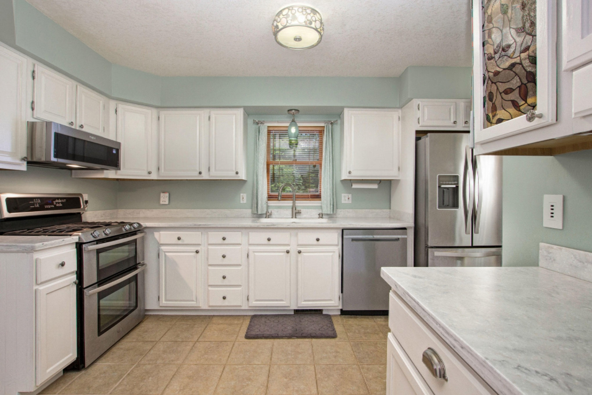 3520 Stearns Road Ludington, MI 49431 - Photo 6 of 86 Fabulous solid surface countertops