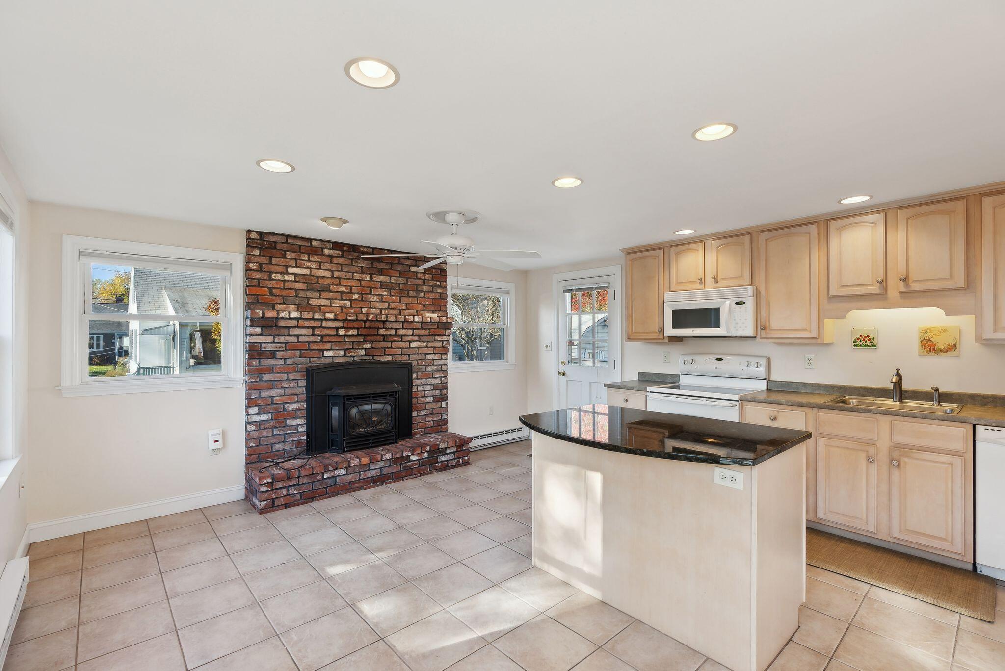 12 Lynda Road Portland, ME 04103 - Photo 8 of 46 Kitchen/Dining/Fireplace