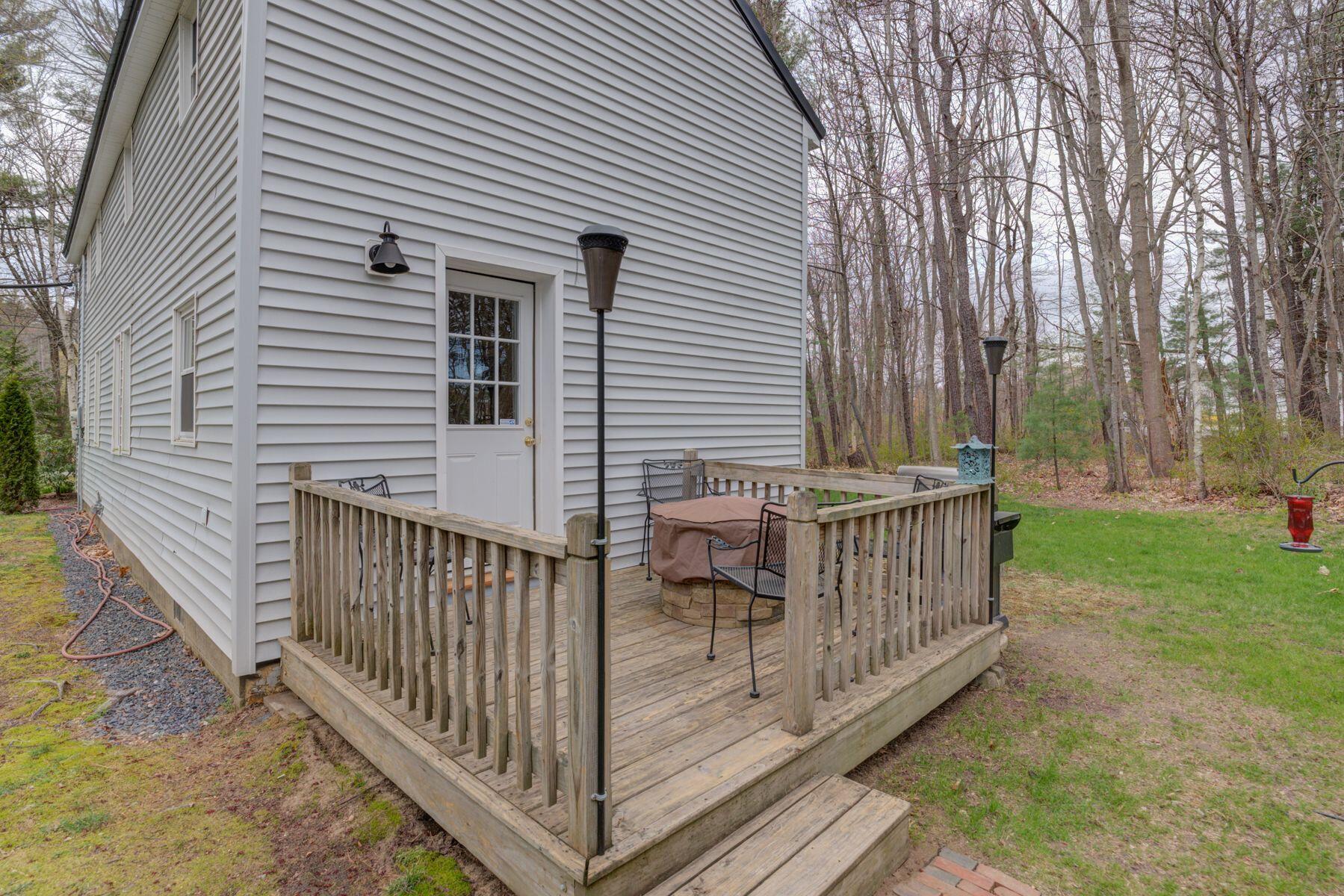 44 Hardy's Bluff Wells Wells, ME 04090 - Photo 4 of 30 Rear entrance to home with deck.