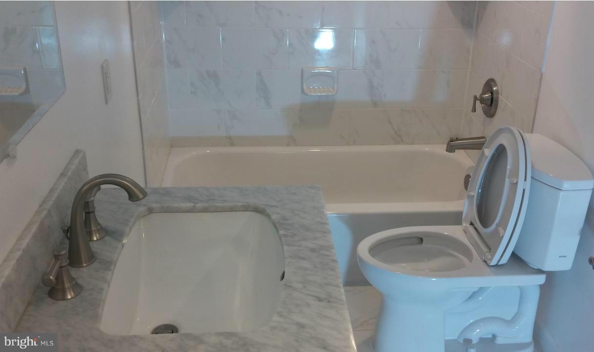 11405 Idlewood Road Silver Spring, MD 20906 - Photo 22 of 28 a bathroom with a sink