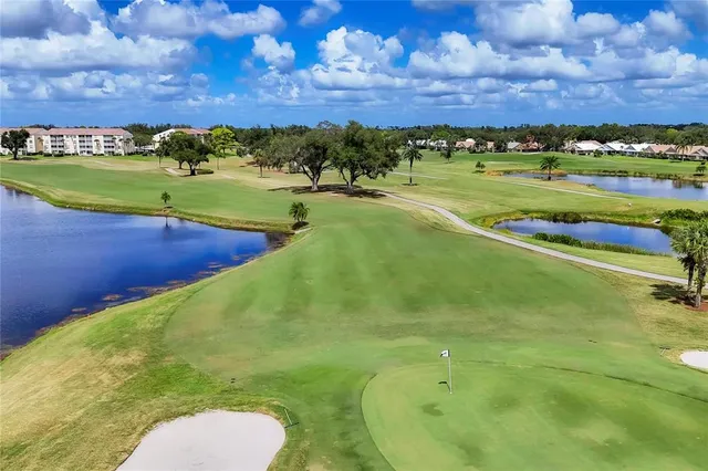 a view of a lake with a city
