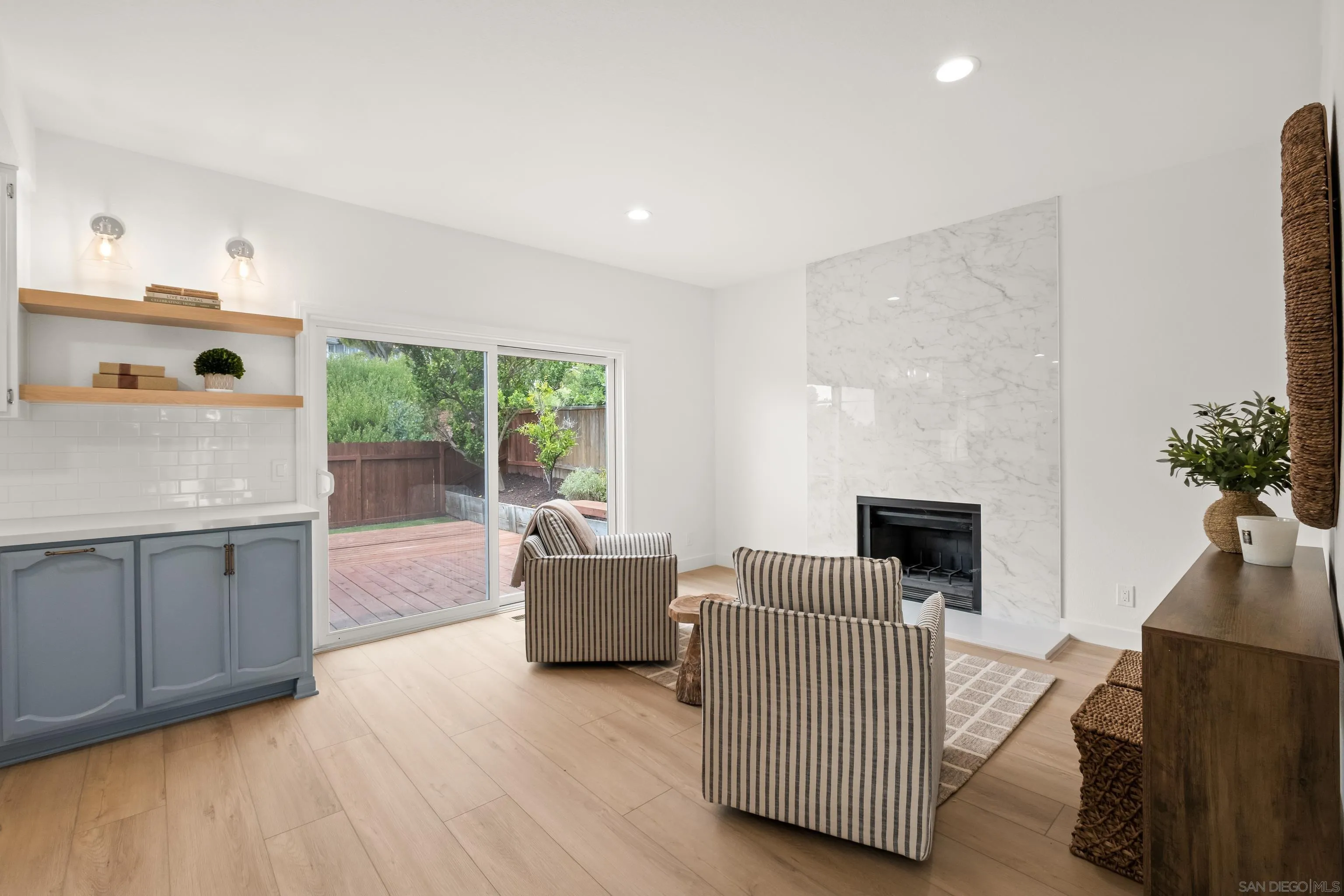11478 Madera Rosa Way San Diego, CA 92124 - Photo 11 of 54 a living room with furniture and a window