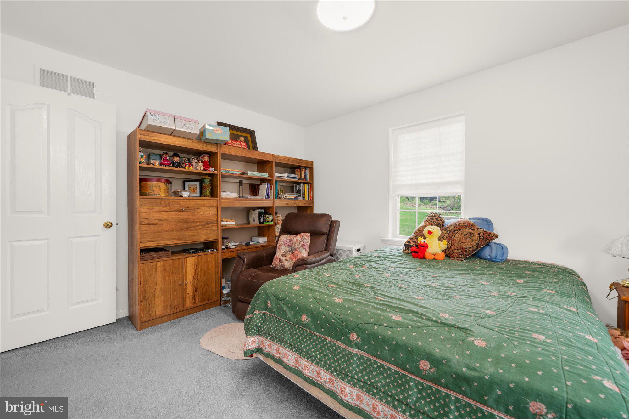 861 Dunkels Church Road Kutztown, PA 19530 - Photo 40 of 55 a bedroom with a bed and a closet