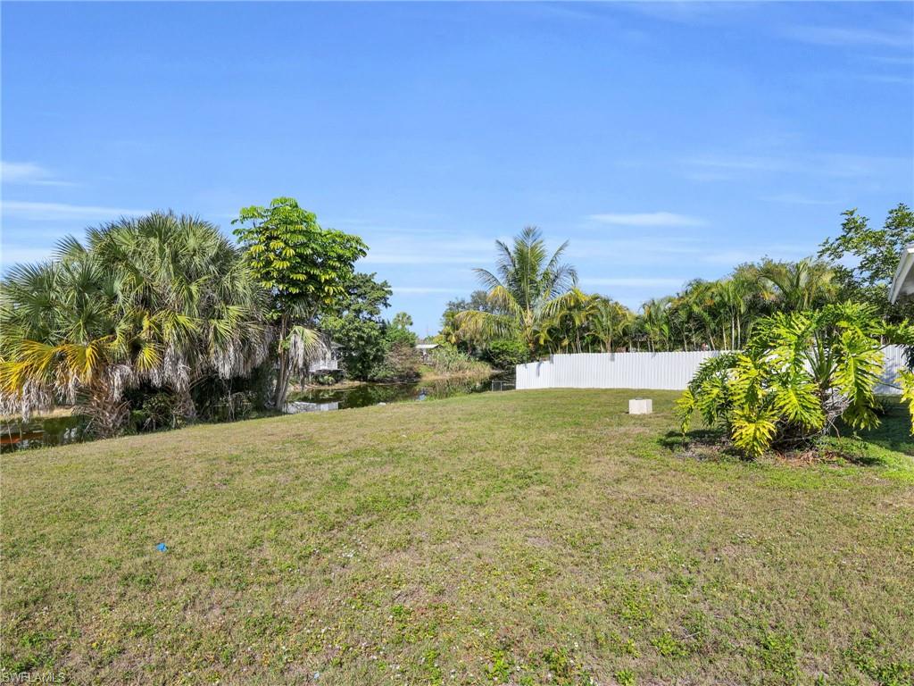 4991 18th Court Southwest Naples, FL 34116 - Photo 26 of 36 a view of an outdoor space and a yard