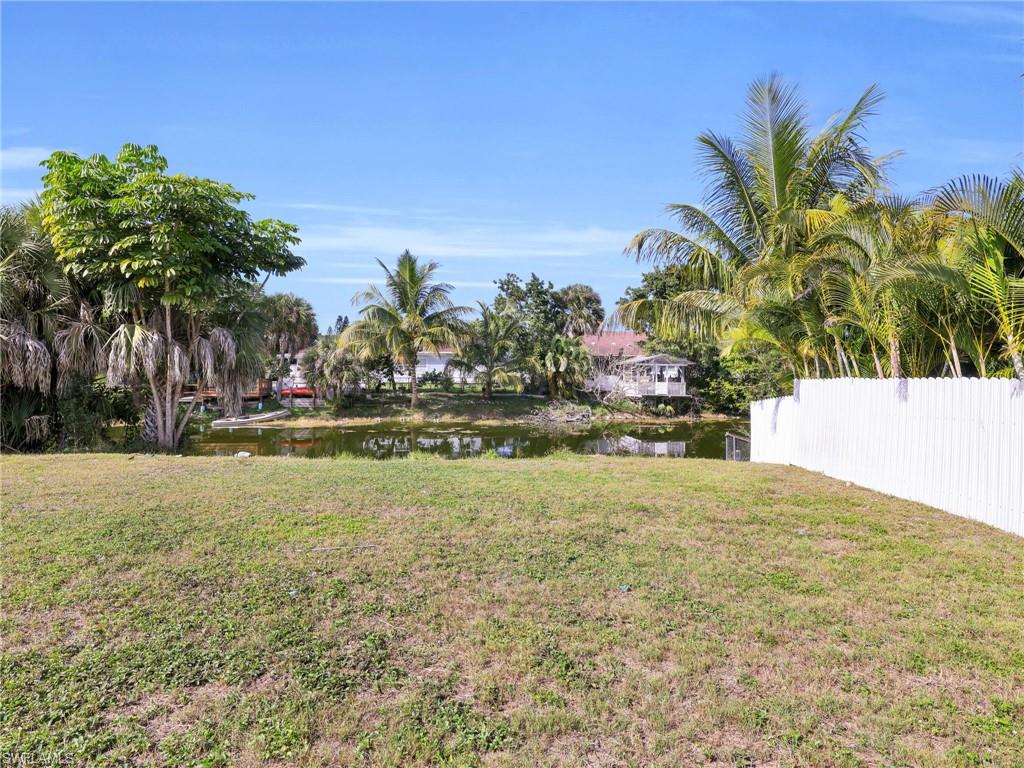 4991 18th Court Southwest Naples, FL 34116 - Photo 31 of 36 a view of swimming pool with a yard