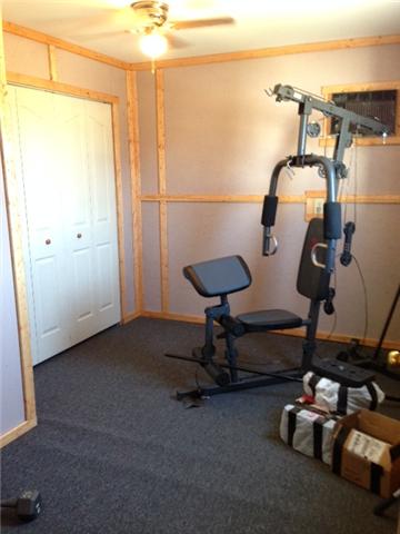 4194 Highship Road Murfreesboro, TN 37130 - Photo 14 of 20 Newly remodeled Room in Workshop currently used as workout space.