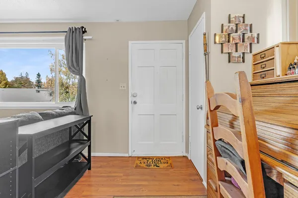 a bathroom with a sink a mirror and a shower
