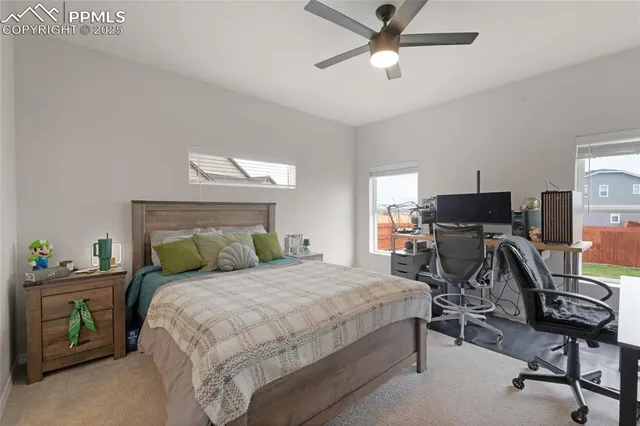 a bedroom with a bed and furniture