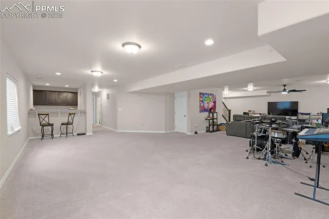 a view of a livingroom with furniture and a livingroom