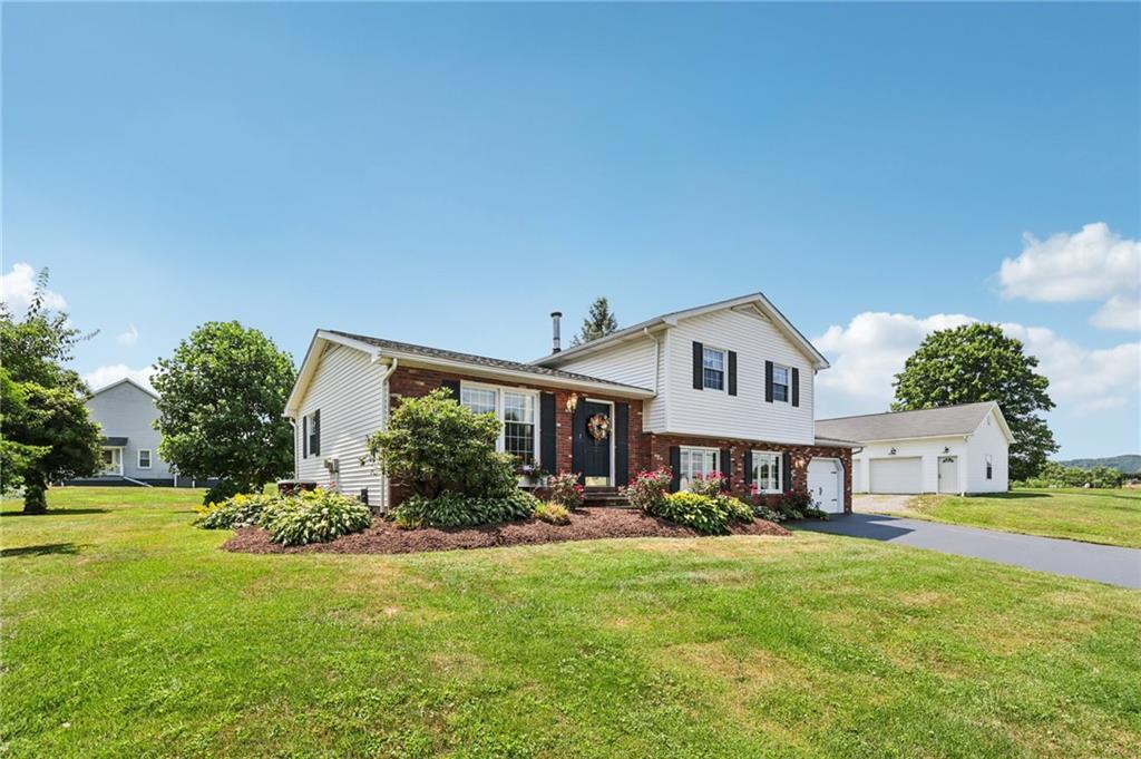 948 9th Street New Castle, PA 16101 - Photo 1 of 31 a house view with a garden space