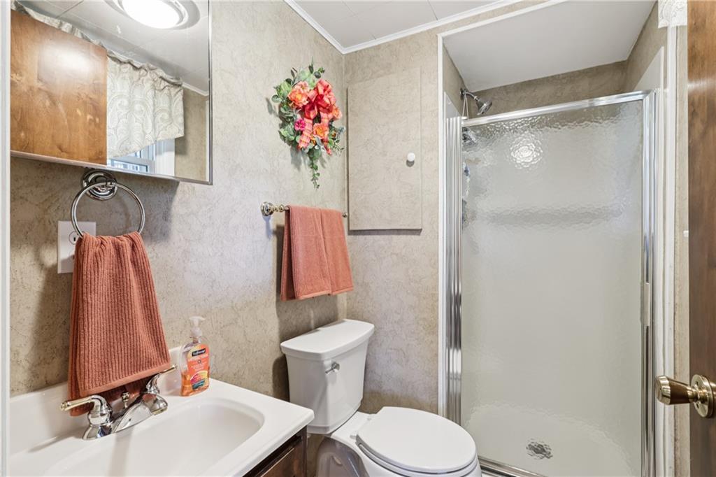 948 9th Street New Castle, PA 16101 - Photo 21 of 31 a bathroom with a sink toilet and shower