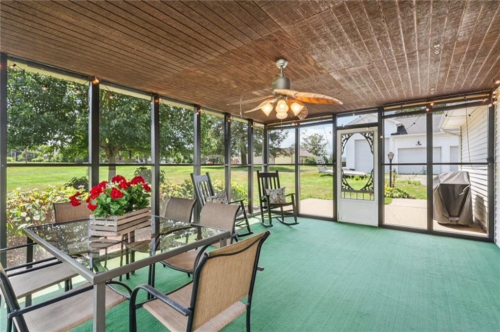 948 9th Street New Castle, PA 16101 - Photo 24 of 31 a view of a dining room with furniture fire pit and garden view