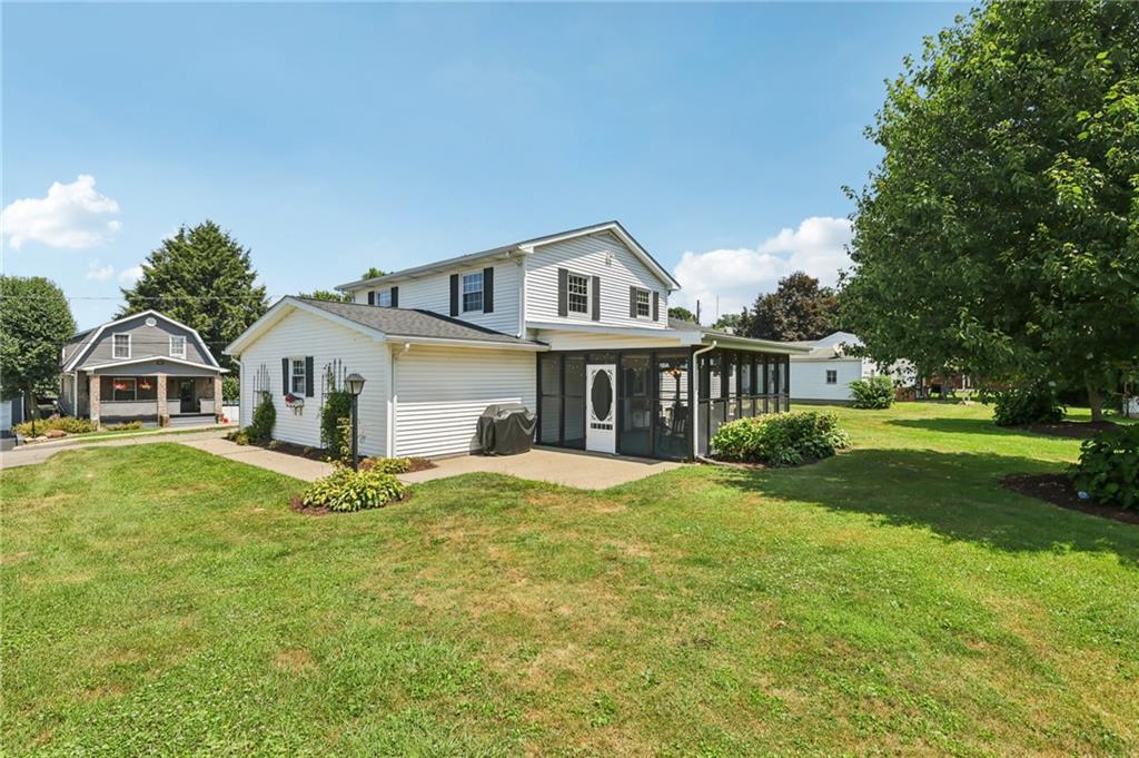 948 9th Street New Castle, PA 16101 - Photo 25 of 31 a front view of a house with a garden