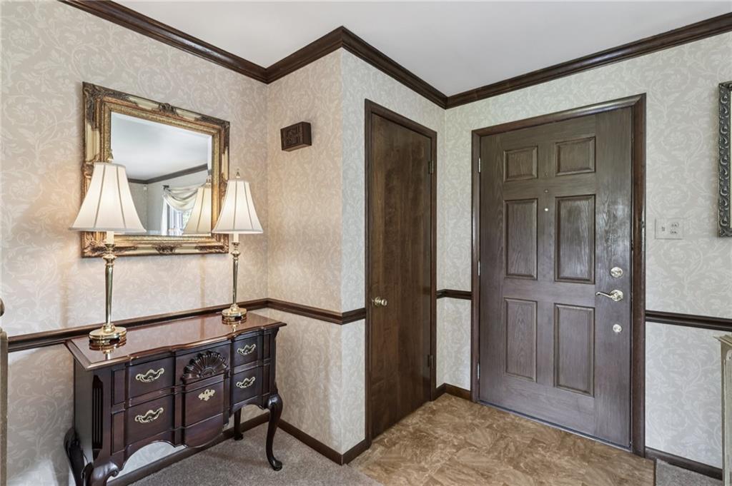 948 9th Street New Castle, PA 16101 - Photo 5 of 31 a view of a hallway with front door