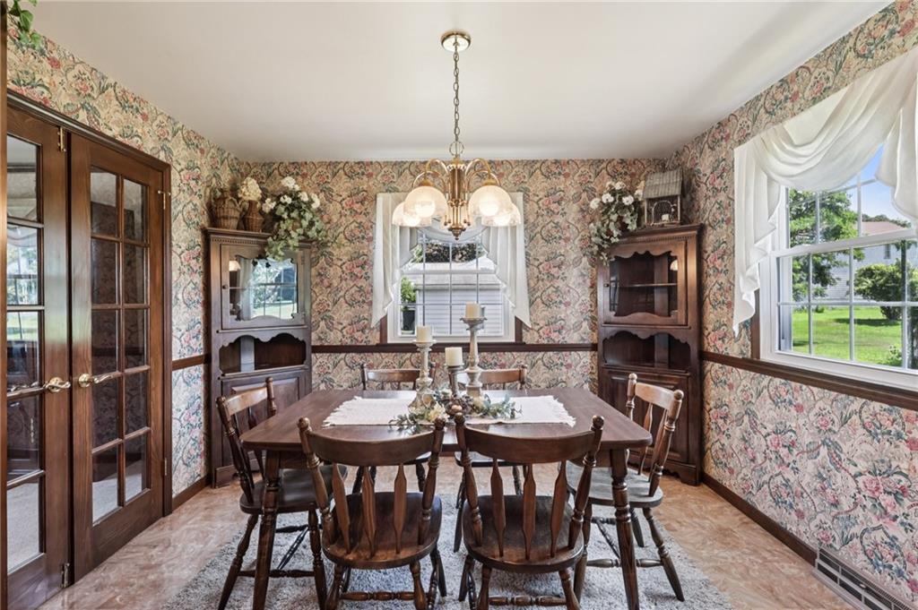948 9th Street New Castle, PA 16101 - Photo 9 of 31 a view of a dining room with furniture window and outside view
