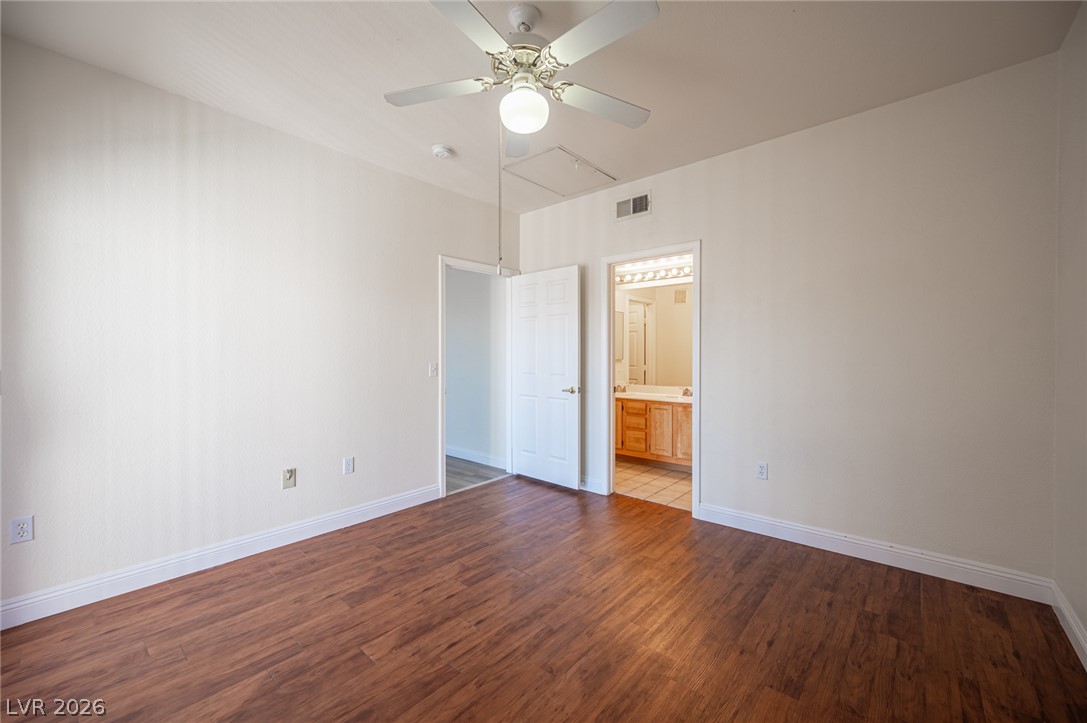 8555 West Russell Road, Unit 2062 Las Vegas, NV 89113 - Photo 22 of 35 A quiet retreat with durable flooring and a refreshing ceiling fan.