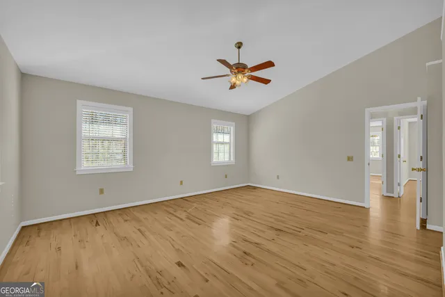 a view of hallway with furniture