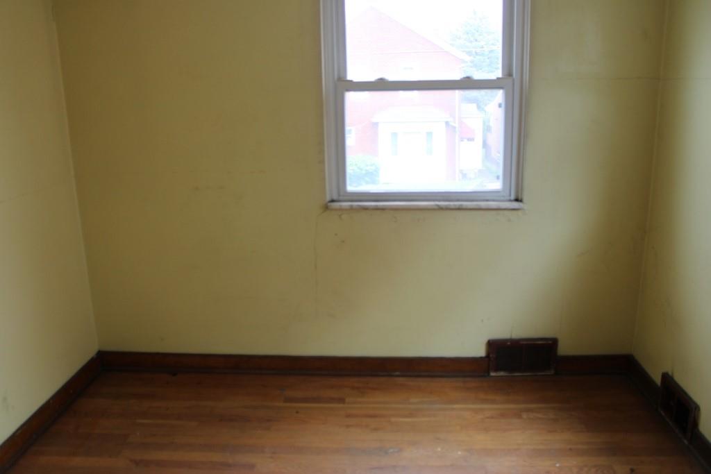 825 Liberty Street Duquesne, PA 15110 - Photo 14 of 25 an empty room with a window