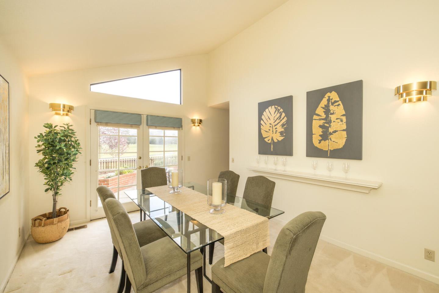 138 Cypress Point Road Half Moon Bay, CA 94019 - Photo 11 of 64 a view of a dining room with furniture and a potted plant