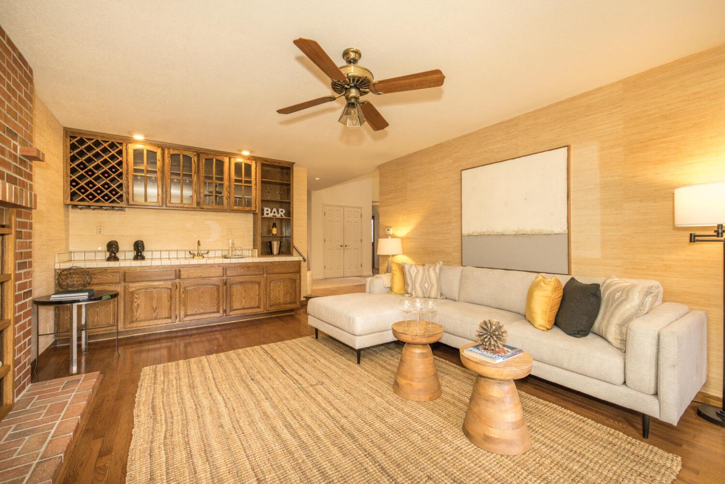 138 Cypress Point Road Half Moon Bay, CA 94019 - Photo 15 of 64 a living room with a couch and wooden floor