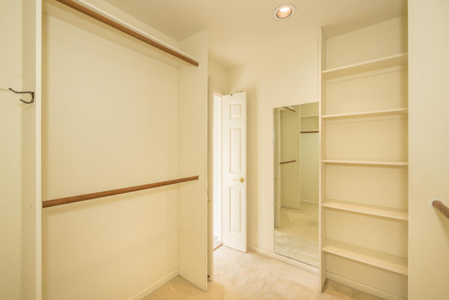 138 Cypress Point Road Half Moon Bay, CA 94019 - Photo 24 of 64 a bathroom with a shower and a glass door