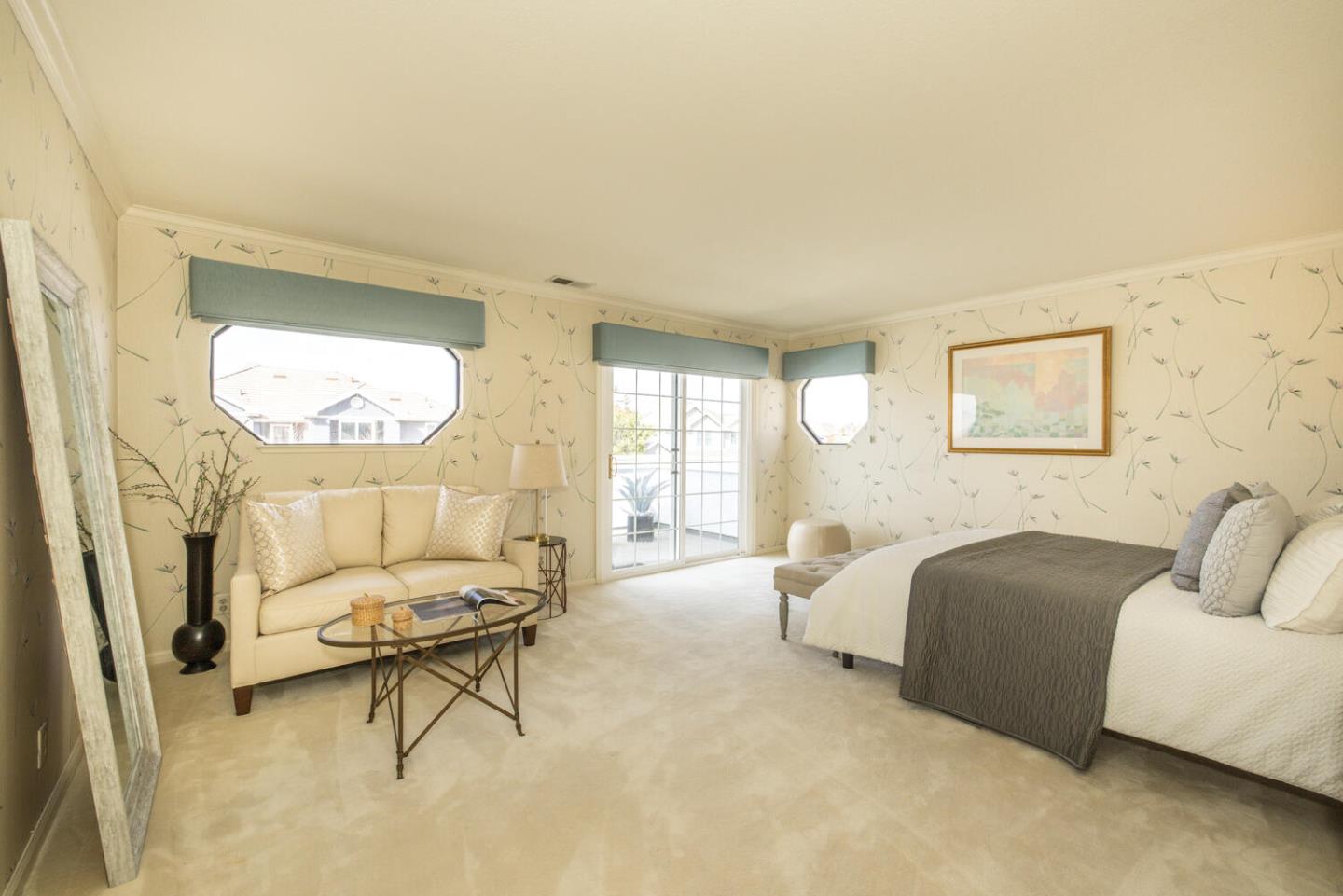 138 Cypress Point Road Half Moon Bay, CA 94019 - Photo 28 of 64 a living room with furniture and a large window