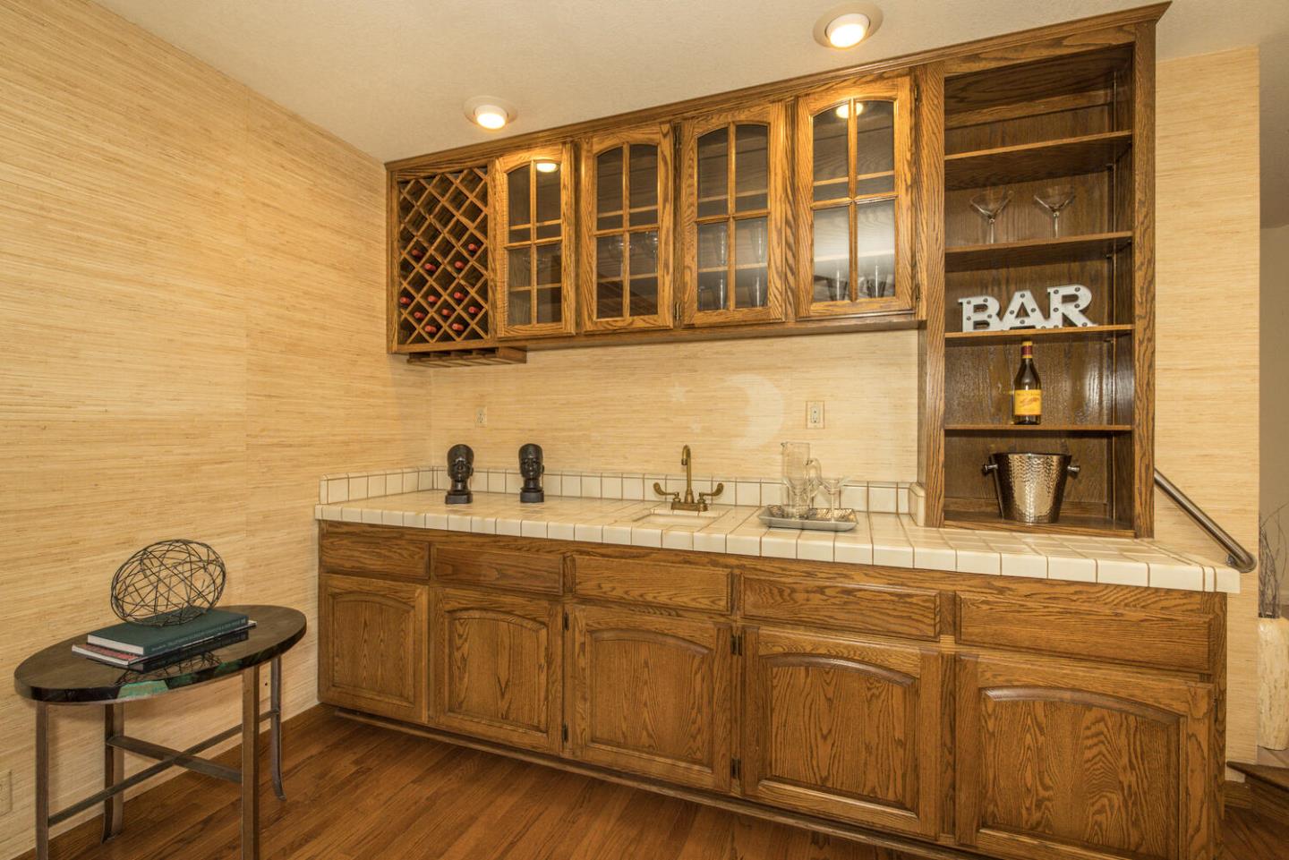 138 Cypress Point Road Half Moon Bay, CA 94019 - Photo 33 of 64 a kitchen with stainless steel appliances granite countertop a sink and cabinets